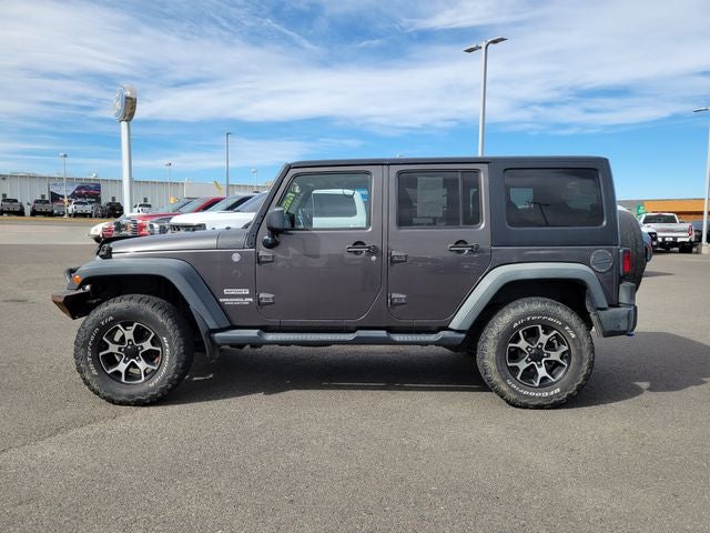 Used 2014 Jeep Wrangler Unlimited Sport with VIN 1C4HJWDG8EL206859 for sale in Laramie, WY